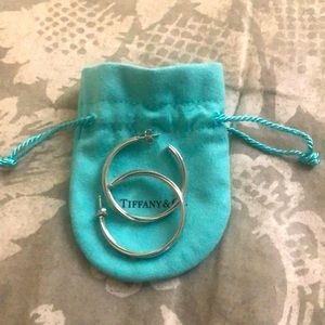 Authentic Tiffany Silver Hoop Earrings. Like new! Comes with Tiffany Bag.